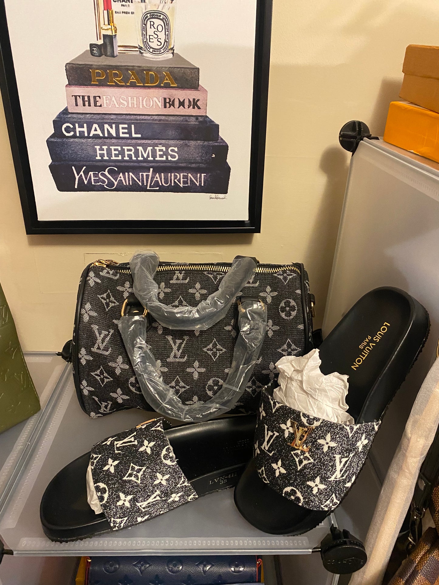 Black satchel Louis Vuitton bag with matching slides