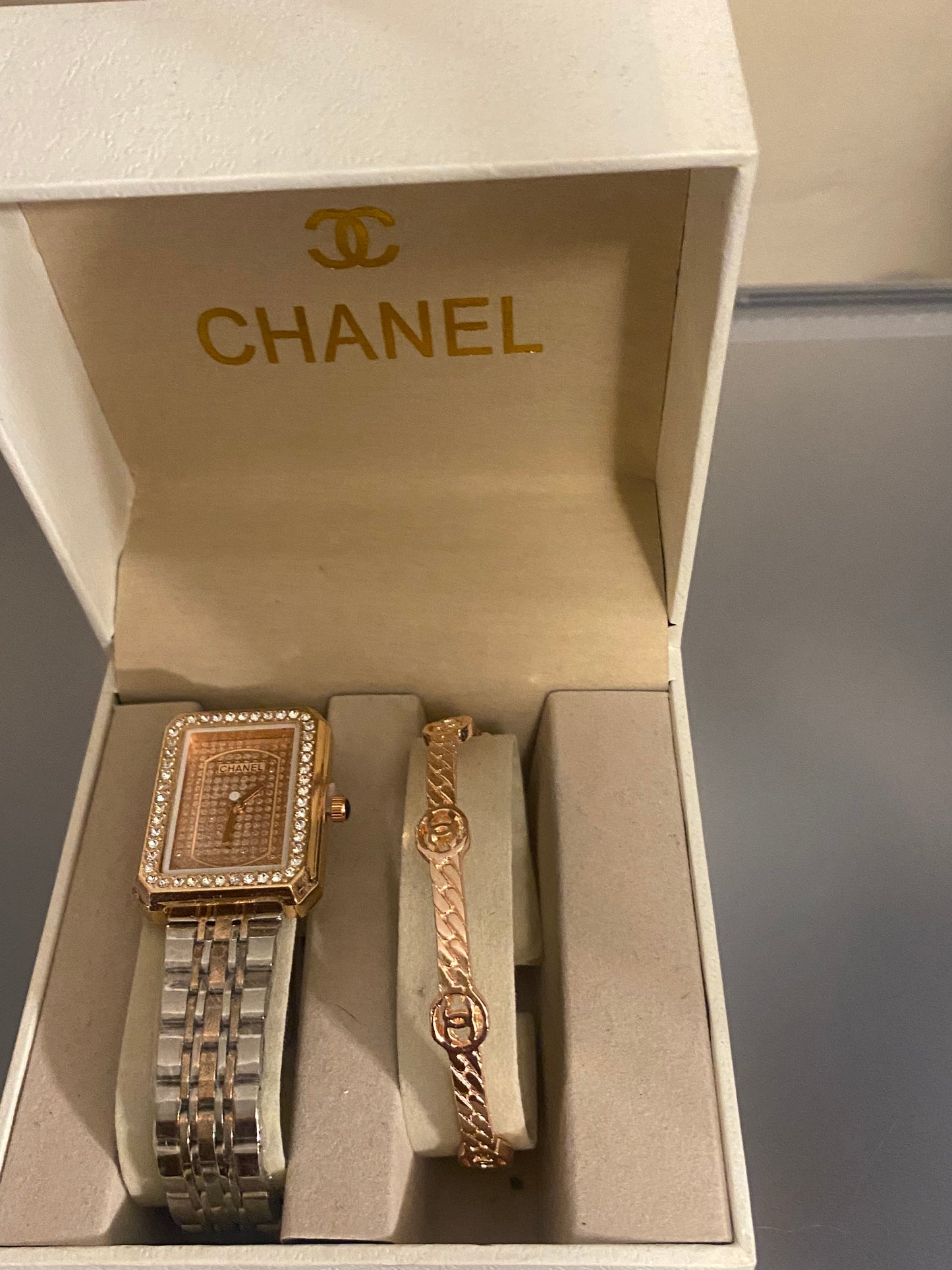Gold Chanel watch with gold bracelet