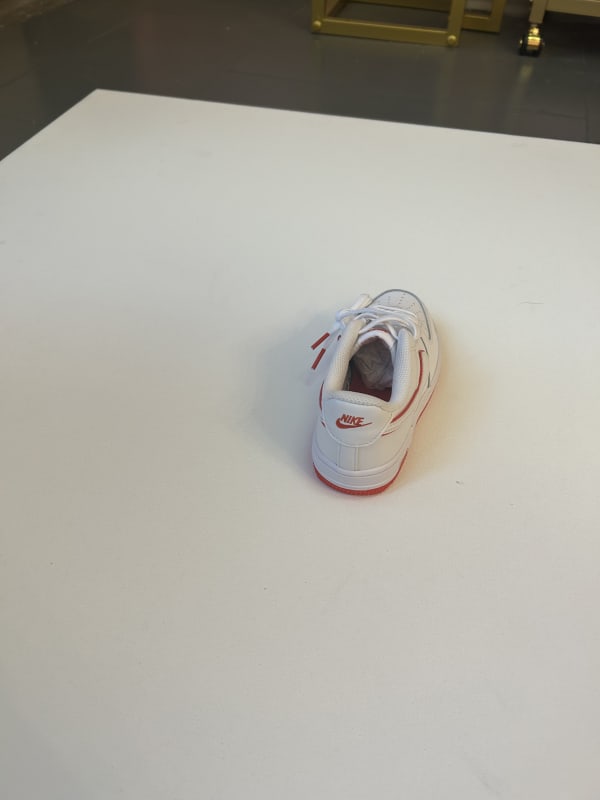 Red and white Nikes for kids