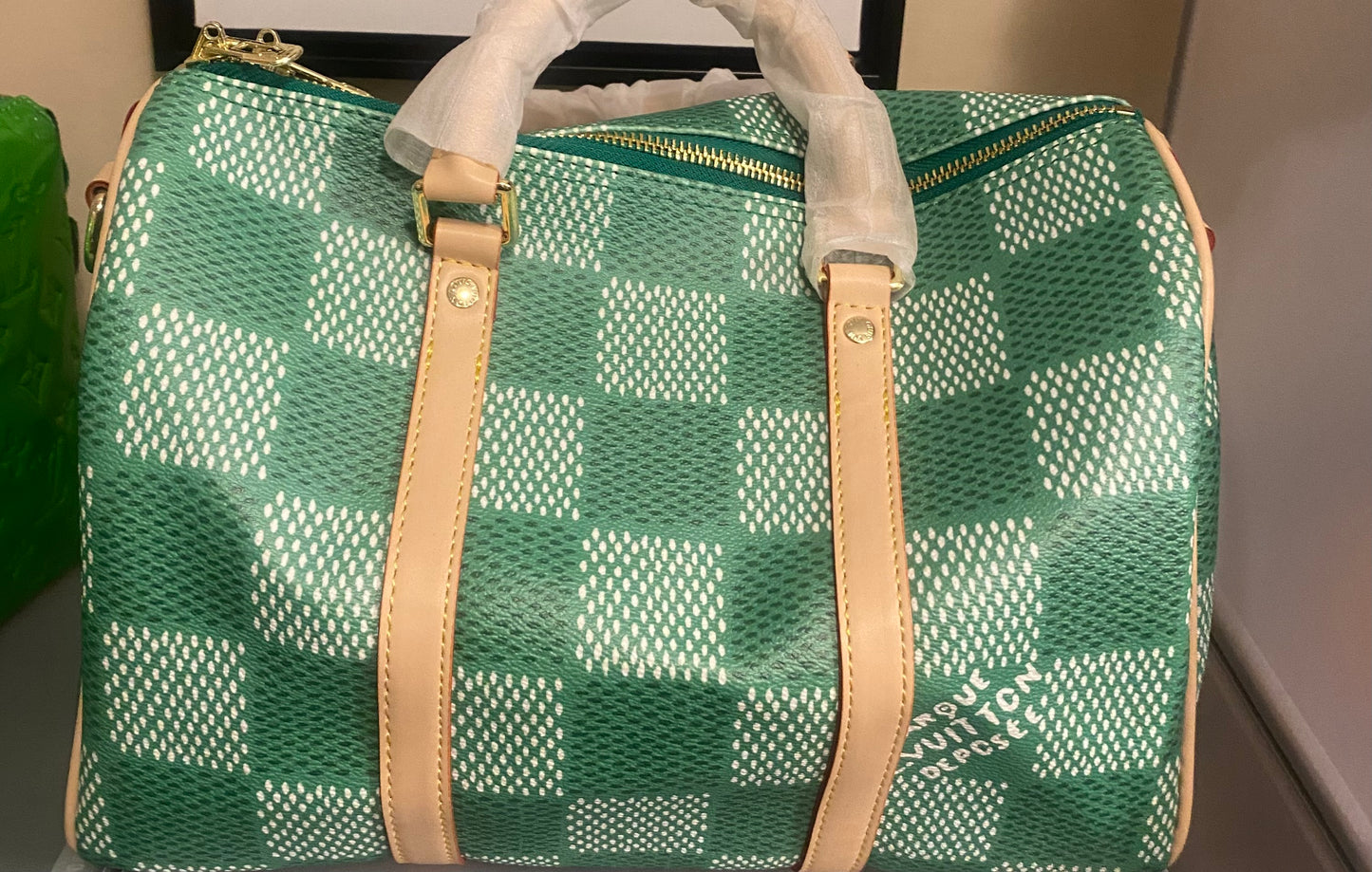 Green and nude Louis Vuitton bag