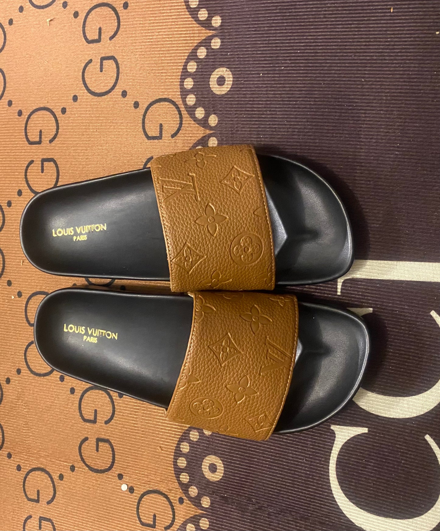 Brown Louis Vuitton slides