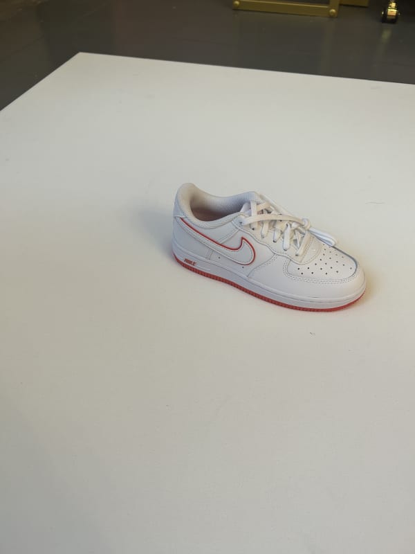 Red and white Nikes for kids