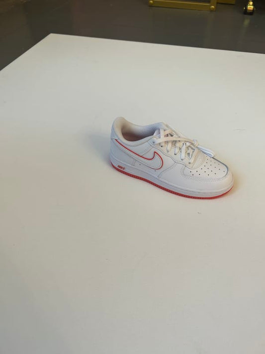 Red and white Nikes for kids